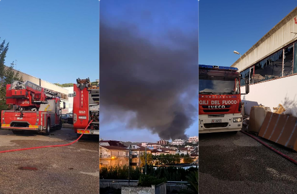Fumo e fiamme in un deposito di moto e monopattini elettrici: Vigili del fuoco al lavoro